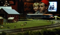 Early visitors Friday evening watching the Metra train